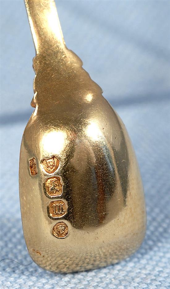 A good pair of Victorian cast silver gilt salt cellars and spoons, by Jane Brownett? height 40mm, weight 7.3 oz/230grms.